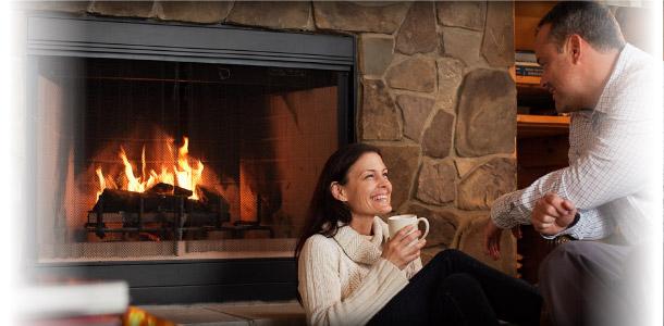 couple by fireplace